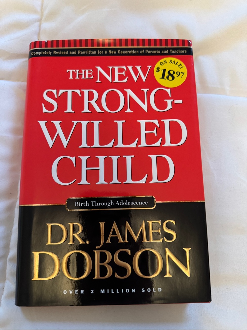 The New Strong-Willed Child by Dr. James Dobson - Red & Black Cover